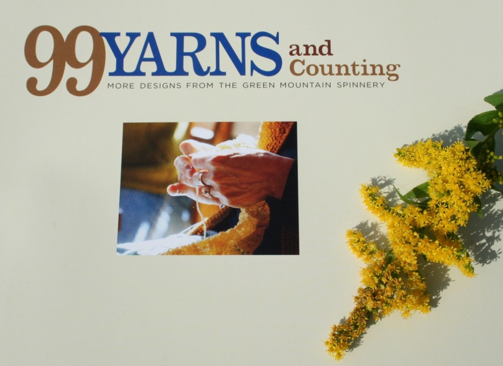 99 Yarns and Counting: More Designs from The Green Mountain Spinnery is the newest book of patterns and designs, published by The Countryman Press of Woodstock, Vermont. Photo of the opening page with a spray of goldenrod from a summer meadow, Moo Dog Knits Magazine.
