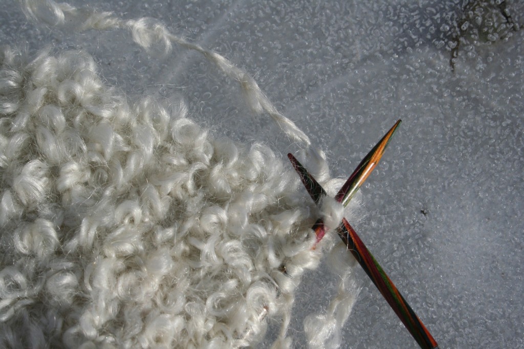 Boucle mohair yarn on New England ice, ecru colorway, 90 percent kid mohair, 10 percent nylon. Moo Dog Knits Magazine.