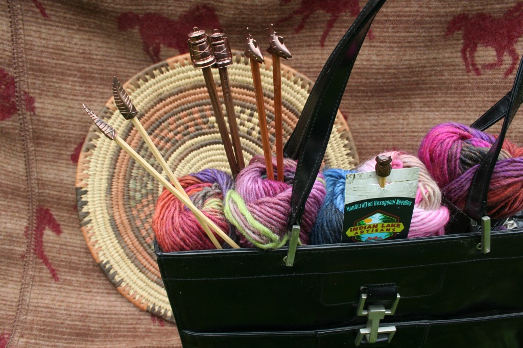 Moo Dog Knits Magazine product reviews - ILA needles, color shifting yarn and a sleek black leather tote for carrying knitting or just for looks.